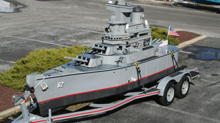 Illustration for article titled Unique jet driven mini battleship replica on Ebay